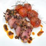 45 day dry aged strip steak - heirloom tomato - fried chili anchovy shallot oil
