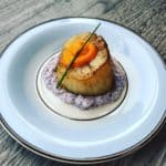 Scallop with Ras el Hanout, Blue Corn Grits, Whey and Roasted Carrot/Harissa Puree